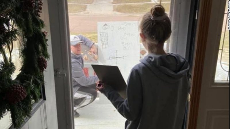 Math teacher shows up at student’s front porch to give her a one-on-one lesson while social distancing